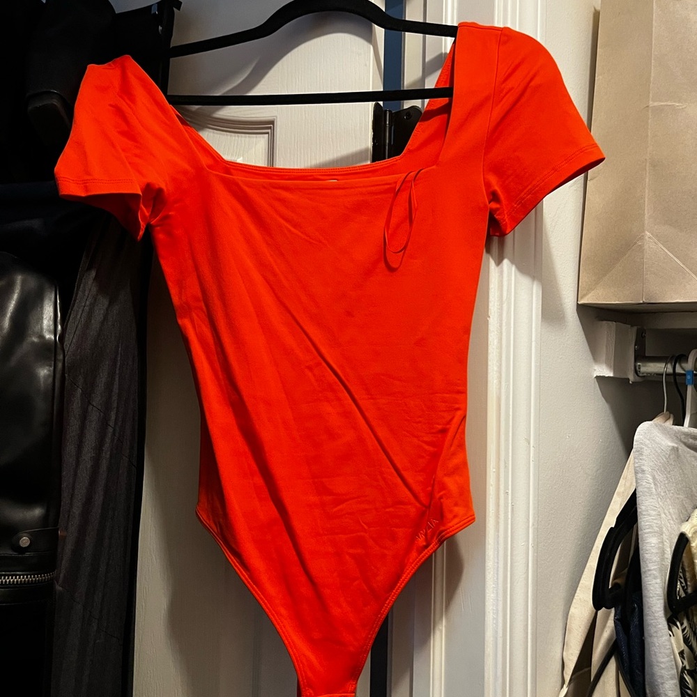 Aritzia Orange Contour Bodysuit Top